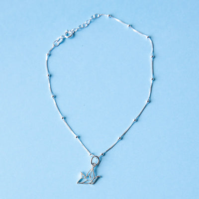 Tobillera Saturn & charm Grulla
